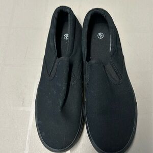 Never worn black, stretchy women’s canvas slip on shoes